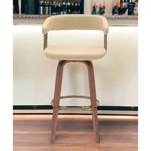 Sedia girevole da bar da 78,7 cm in similpelle color crema e marrone legno