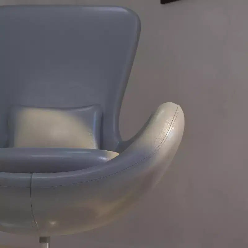 Poltrona lounge a forma di uovo con schienale alto e base girevole in metallo a 360°